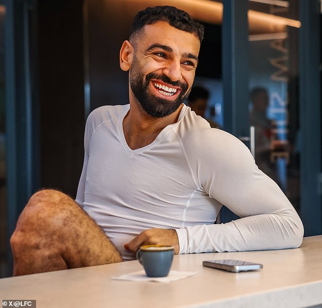 Mohamed Salah has been snapped with a cup of coffee and looks cheerful