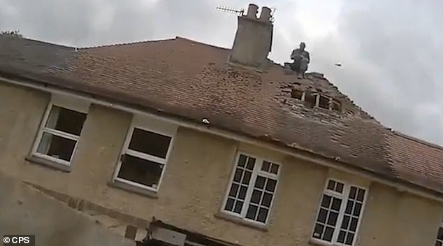 Video footage shows Mark Coates 'systematically destroying' the house as a bitter row escalated