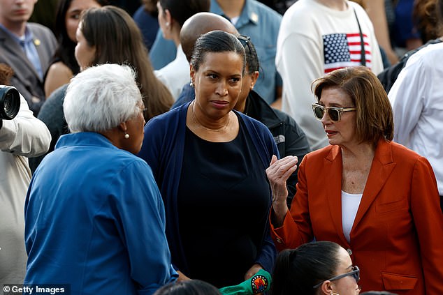 Speaker Emerita Nancy Pelosi (right) was caught on camera in a heated exchange with former acting DNC Chair Donna Brazile (left) as Washington DC Mayor Muriel Bowser (center) stood between them