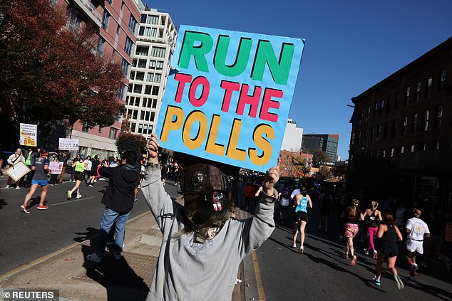 Spectators line the streets of Brooklyn to support runners during the 2024 New York Marathon