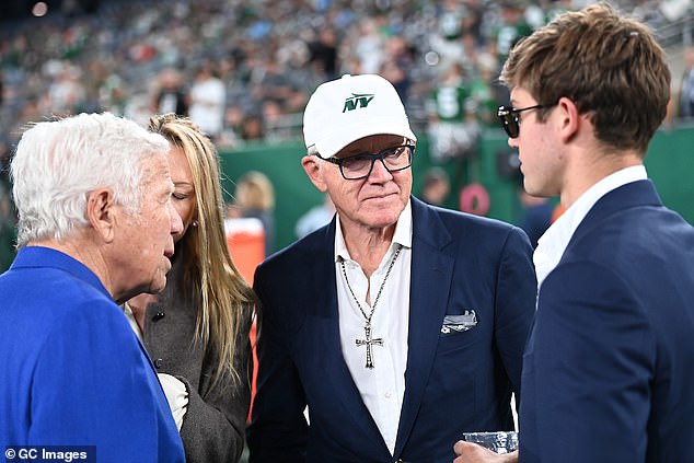 Robert Kraft, Woody Johnson and Brick Johnson talk before a Patriots-Jets game