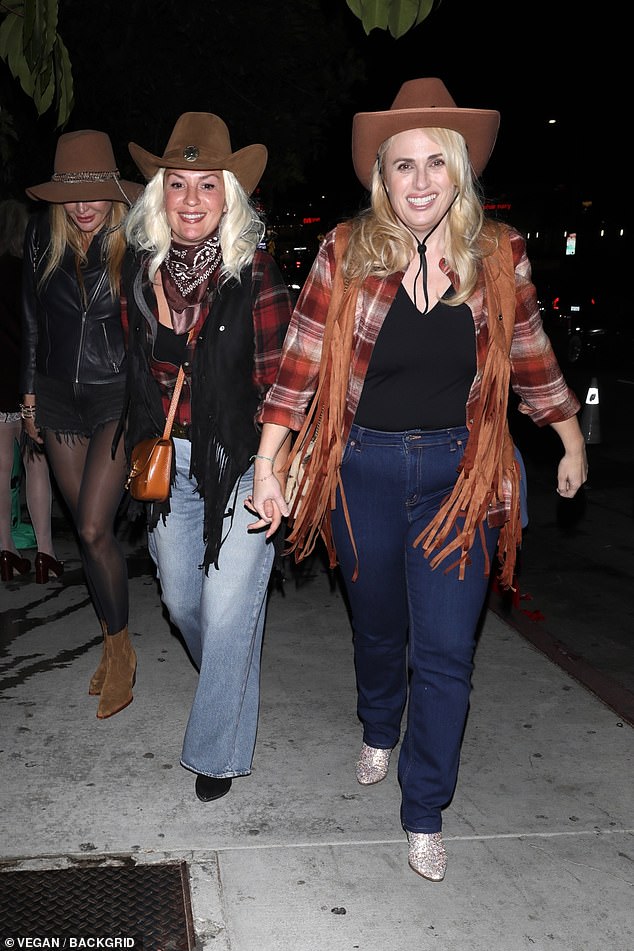 Rebel Wilson and his wife Ramona Agruma wore matching cowgirl costumes as they attended Vas J Morgan and Michael Braun's Halloween party on Thursday