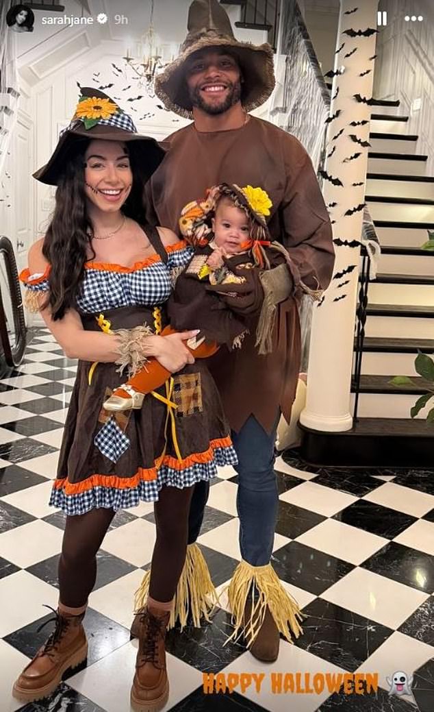 Cowboys quarterback Dak Prescott dressed as a scarecrow with his girlfriend and daughter