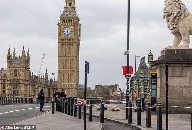 Police swarm Westminster Bridge after man stabbed in front of