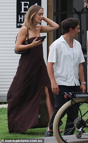 Pregnant Steph Claire Smith, 30, beamed on Friday as she stepped out to attend the wedding of Sea FM star Luke Forrest and Emily Rippingale in Kawana. Pictured with husband Josh Miller