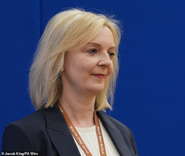 Liz Truss (pictured) reportedly spent her last days in the office studying weather maps and preparing British radiation cases after US spies raised concerns that Putin was seriously about to launch a nuclear bomb