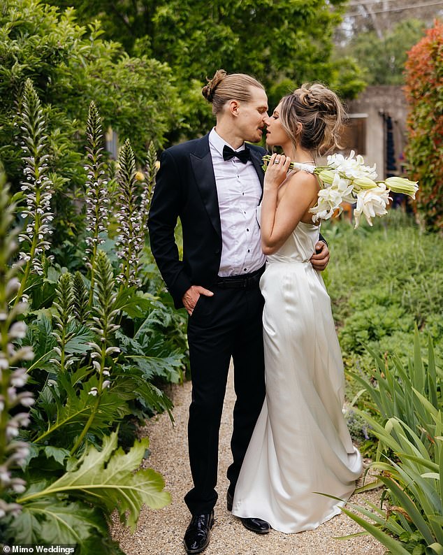 Woody Whitelaw has married his long-time partner Mimi Gibbs in a beautiful ceremony at the Euroa Butter Factory in Victoria's scenic north-east. Both shown