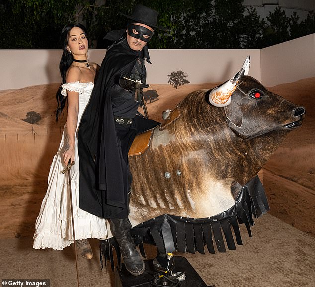 Rita and her husband Taika Waititi rode a mechanical bull at Vas J Morgan and Michael Braun's star-studded Halloween party in West Hollywood on Thursday night