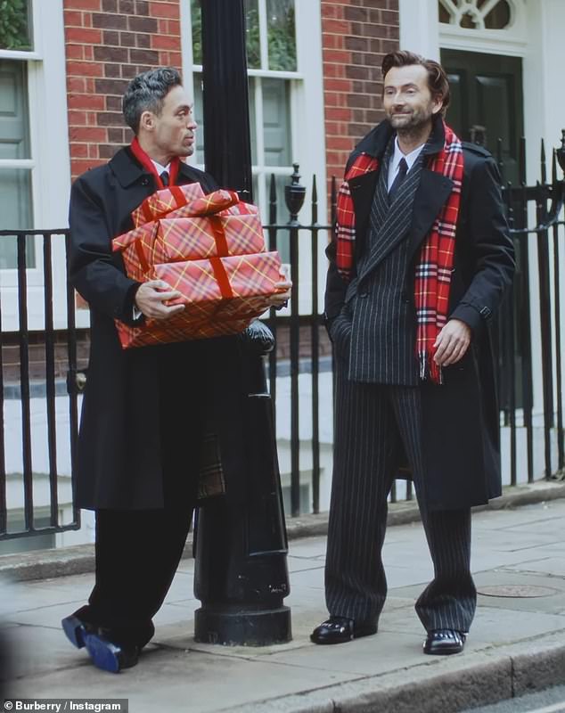 Rivals stars David Tennant and Alex Hassell teamed up with British fashion house Burberry on Wednesday for a striking London-themed Christmas ad