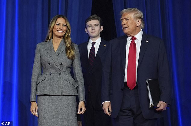 Trump, 78, will also become the oldest president ever inaugurated, beating President Joe Biden's record by five months. (Image: Donald, wife Melania and their son Barron on stage in West Palm Beach as Trump delivered his victory speech on Tuesday evening)