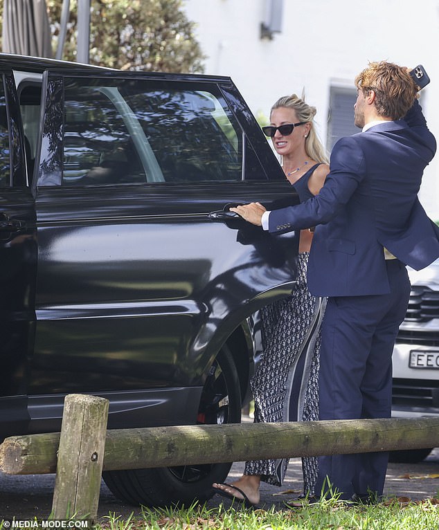 The PR queen tied up her blonde locks and clutched a small purse as she walked to a waiting car after lunch