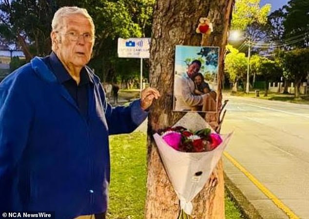 Following the 12-year-old's tragic death, Charlotte's heartbroken family set up a memorial in a tree near the school with a small memorial, photo and flowers (photo: Charlotte's grandfather, Bill, pictured at the memorial)