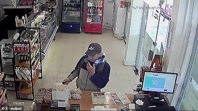 A bandit brandishes a kitchen knife as he tries to rob a deli in Cipolletti, Argentina, but decided against it when confronted Thursday by a female worker holding a larger knife