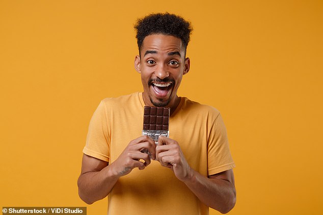 When you walk to the snack cupboard, do you reach for a pack of chips or a chocolate bar? Your answer can reveal a lot about your personality, according to a new study (stock image)