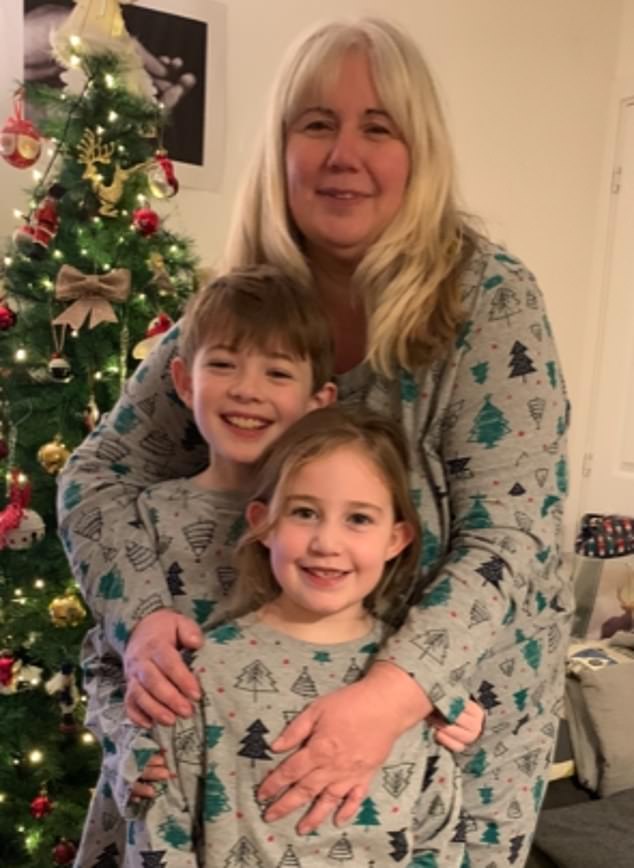 Becki Buggs was 43 when she received a devastating pancreas diagnosis, with the nurse motivated to undergo tests after her husband noticed she looked like 'a Minion', which later turned out to be jaundice. Here Becki is pictured with her two children Jacob and Georgie, who were 9 and 8 years old respectively