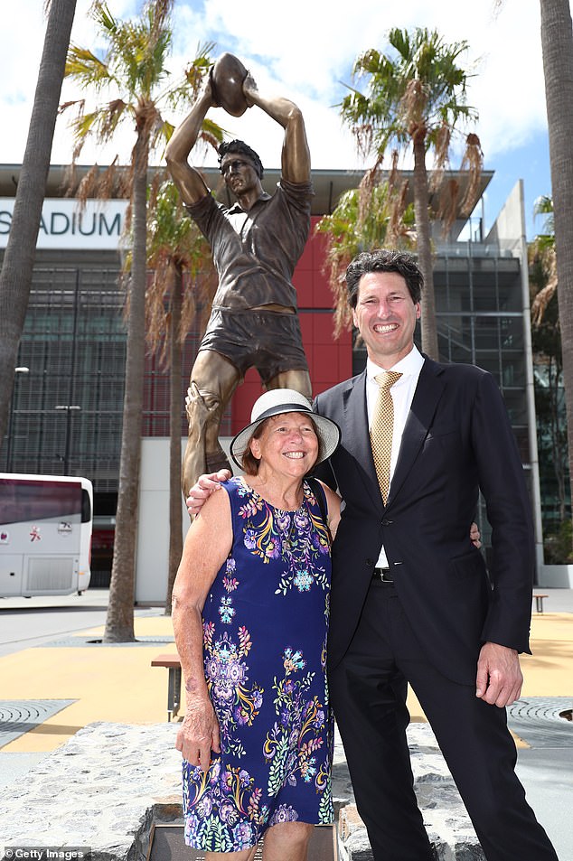 John Eales is pictured with his mother Rosa in front of the statue erected in his honor at Suncorp Stadium in Brisbane