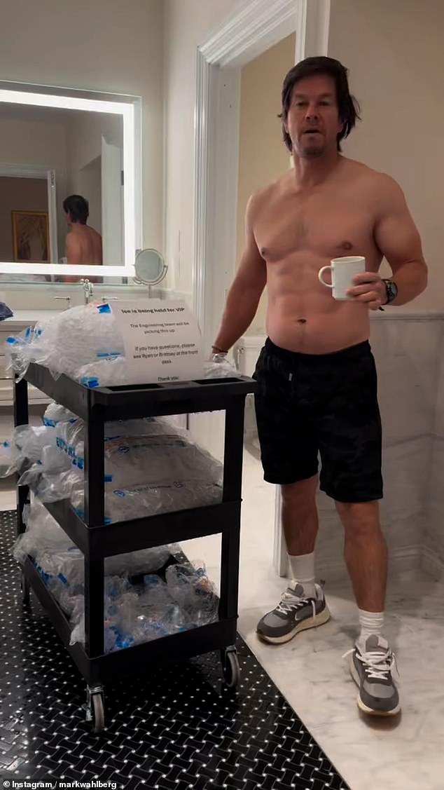 Mark Wahlberg showed off his toned abs in a new Instagram video on Sunday as he ordered a cart of ice cream from room service to continue his crazy health regimen