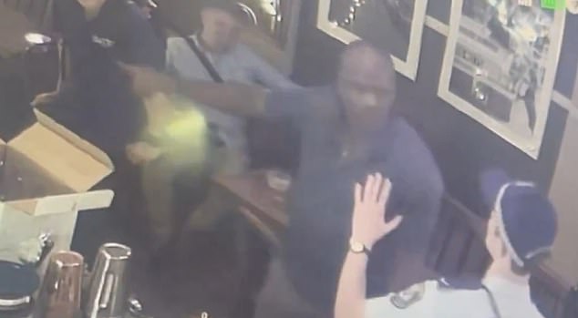 CCTV footage from Sydney pub Pappy's Bar showed the moment police arrived to arrest Sailor after he allegedly committed two assaults (pictured)