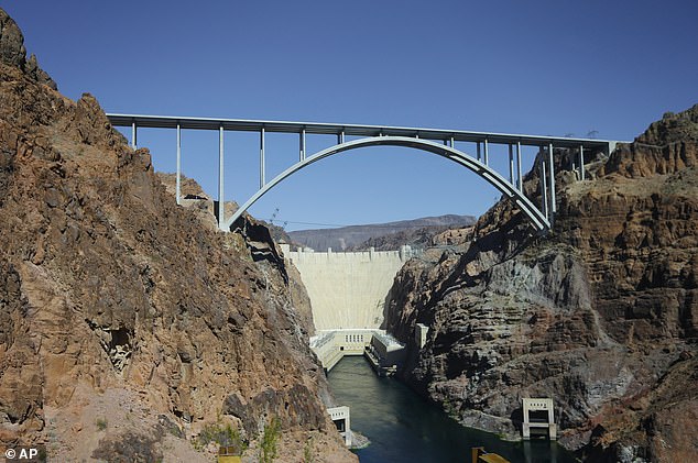 This October 2, 2012 file photo shows the Hoover Dam and Mike O'Callaghan-Pat Tillman Memorial Bridge from the heliport in Boulder City, Nev.