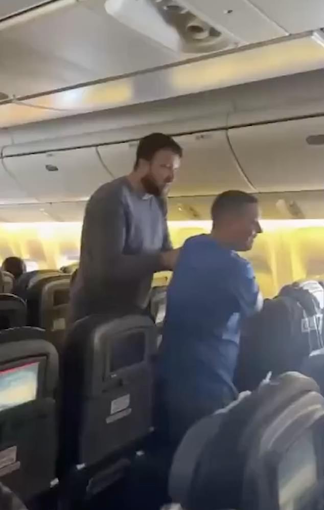 Shocking video footage on board the plane shows a man in a blue T-shirt, believed to be 44-year-old airline safety instructor Ilya, being dragged to the back of the plane by an unnamed man.