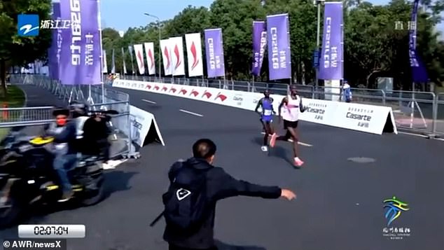 November 3. The footage shows Ethiopian runner Tesfaye Deriba Ketema in the lead, with his Kenyan rival Moses Kibet close behind. As they approach the finish line, both runners appear to misinterpret the staff's hand signals and take a wrong turn