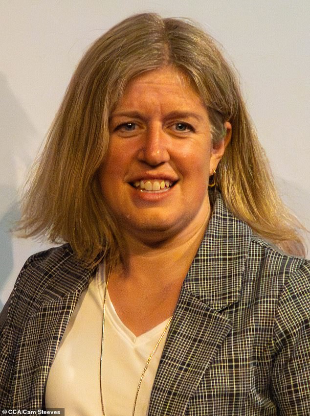 The photo shows Prime Minister Susan Holt of New Brunswick. She has degrees in chemistry and economics from Queen's University and has been involved in the past with public health groups such as the New Brunswick Lung Association