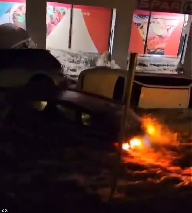 Footage shows strong currents washing away cars as floods raged through the streets of Cadaques, Girona this morning