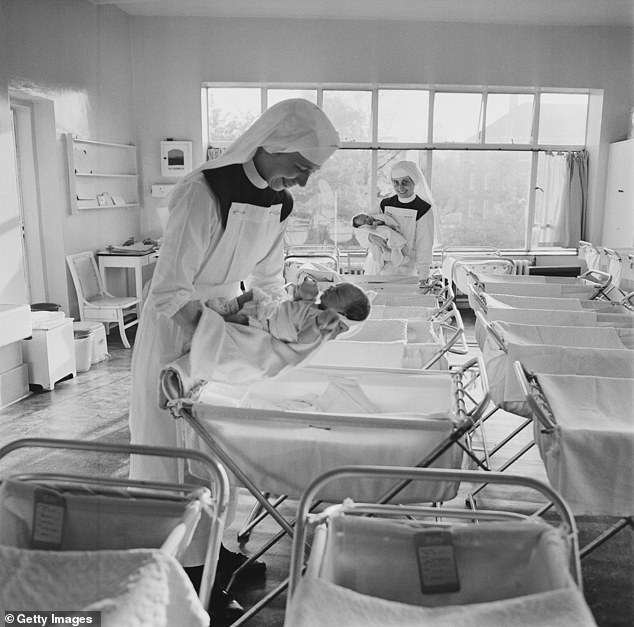 The women, now 57, were born within hours of each other in the same hospital in the West Midlands in 1967. (Stock photo of a maternity ward in 1967)