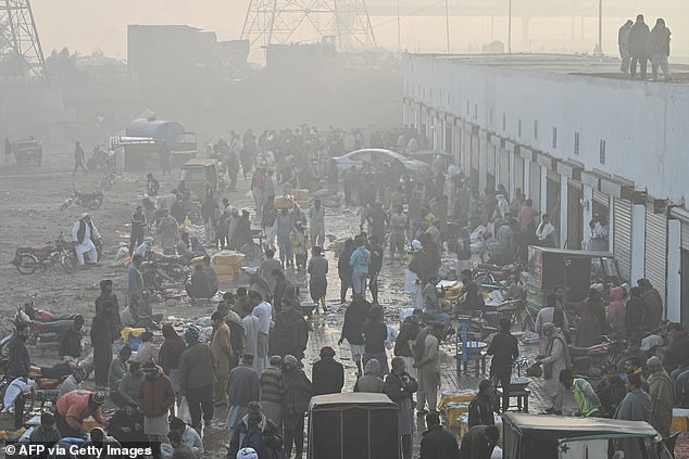 Researchers from the Max Planck Institute for Chemistry used advanced numerical simulations to estimate mortality due to air pollution and extreme temperatures. Pictured: Lahore in smog on November 21