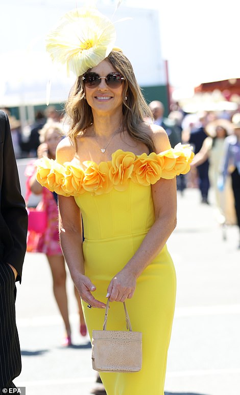 Elizabeth Hurley bucked the red theme as she stepped out in a yellow ensemble