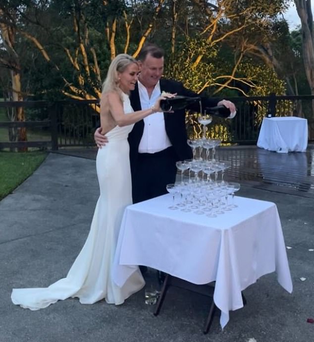 Sasha also posted a photo of the newlyweds cutting their wedding cake during their reception on Saturday