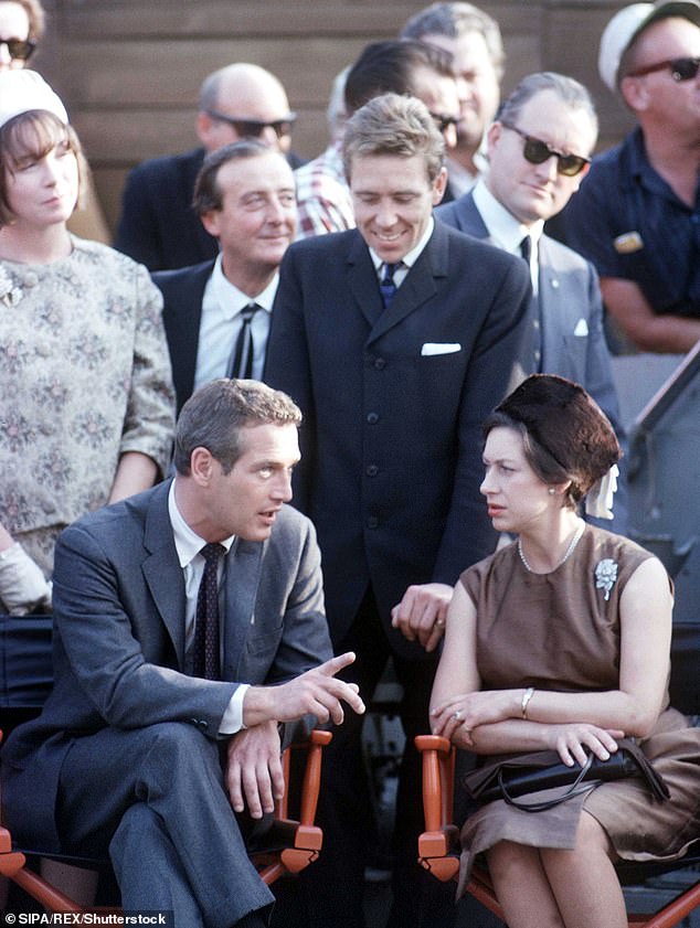 Tensions began to emerge in the marriage of Princess Margaret and her husband, the Earl of Snowdon, both seen chatting with Paul Newman on the set of Torn Curtain in 1965.