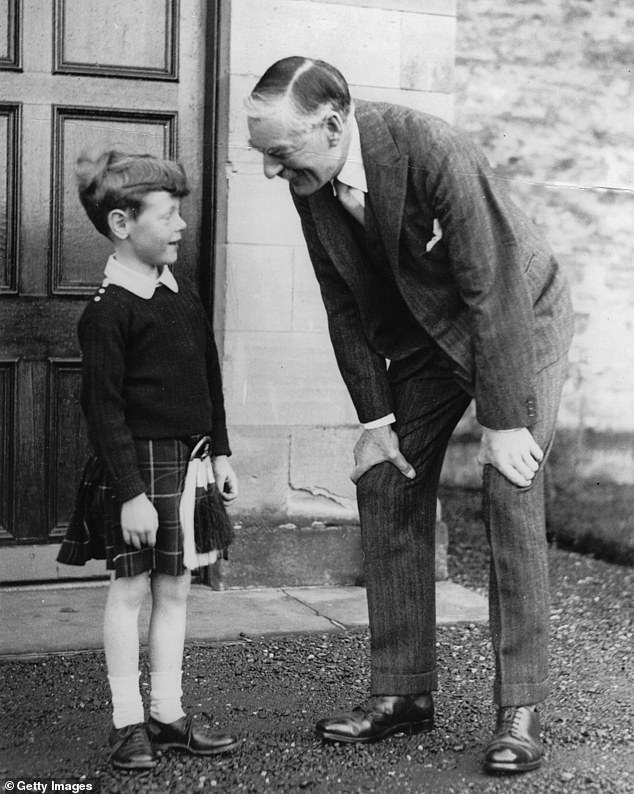 Neville Chamberlain with Robin Douglas-Home as a boy in Hirsel, Scotland