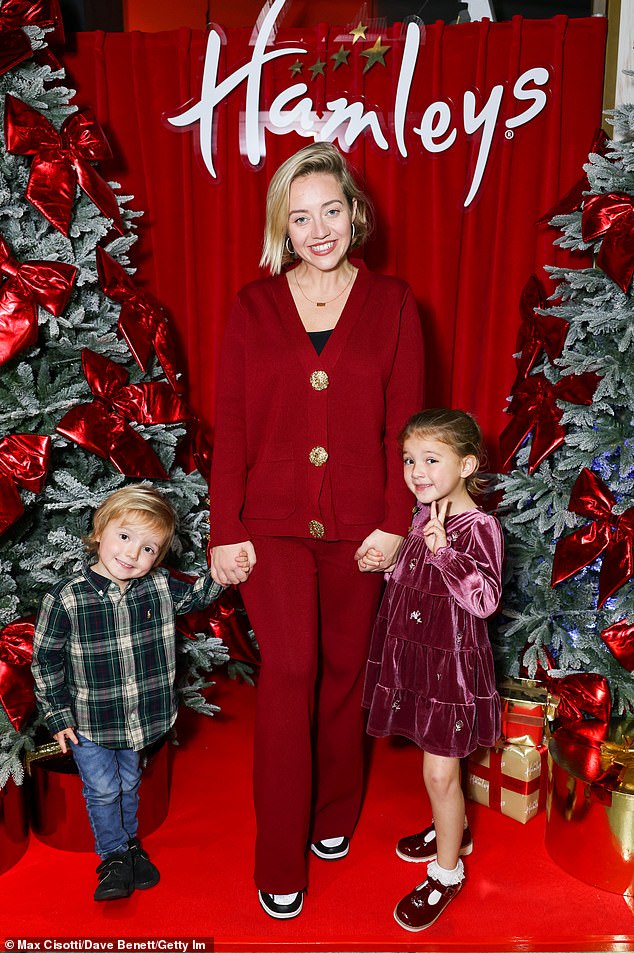 Kelsey Parker enjoyed a night out with her children Amelia, five, and Bodhi, three, at the Hamleys VIP launch party in London on Thursday