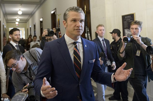 Pete Hegseth, Trump's nominee for secretary of defense, speaks to reporters on the Hill. Senator Tammy Duckworth denounced his qualifications to lead the Pentagon, calling him a 