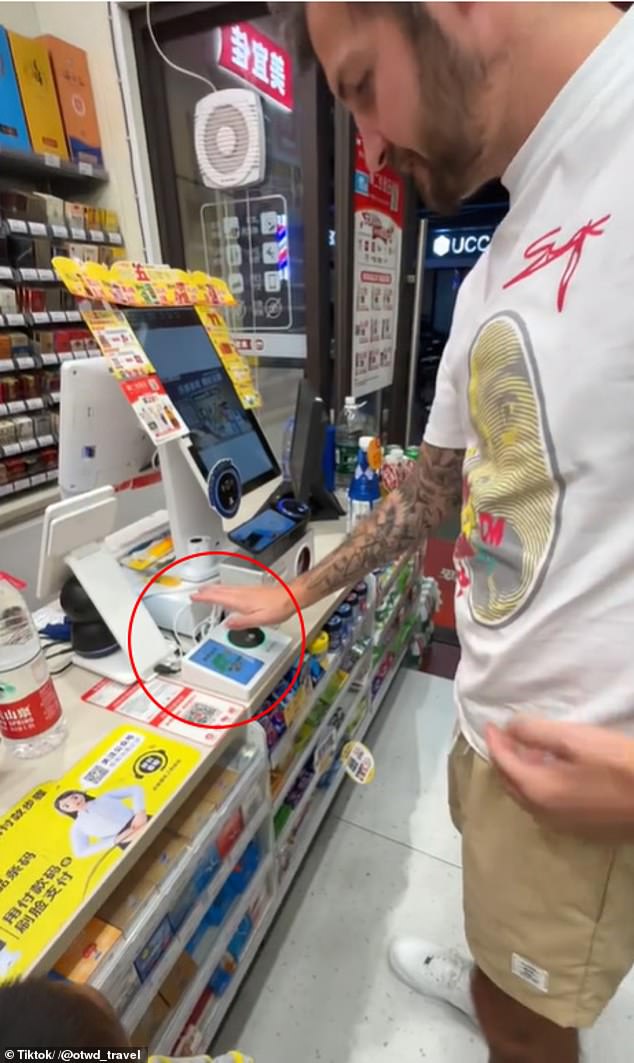 A British tourist was amazed by cutting-edge technology in China after paying for a packet of crisps with his hand in a supermarket