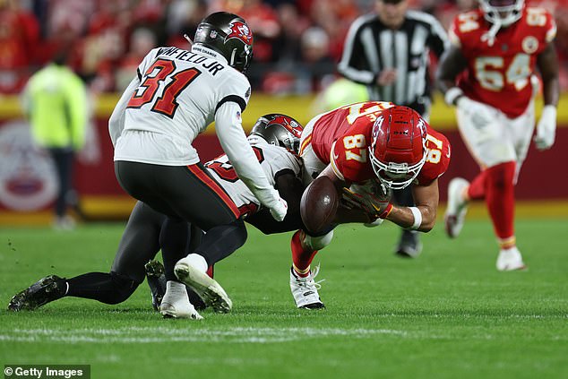 Travis Kelce fumbled with the ball as girlfriend Taylor Swift watched in Kansas City