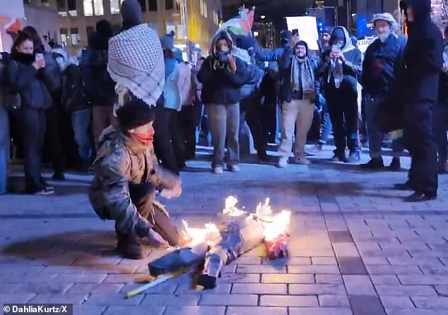 Anti-Israel protesters burned an effigy of Israeli Prime Minister Benjamin Netanyahu in the middle of the street