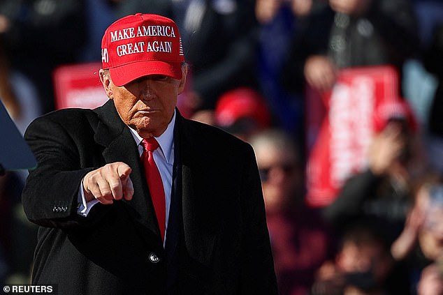 Republican presidential candidate and former US President Donald Trump gestures during a campaign rally in Lititz, Pennsylvania, USA, November 3, 2024