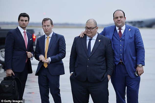 Steven Cheung (third from right, with Trump adviser Boris Epshteyn) returns to the White House as communications director