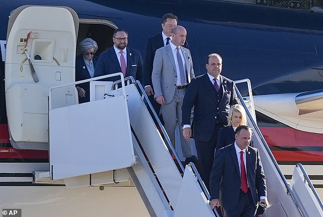 From left, Susie Wiles, Jason Miller, Elon Musk, Stephen Miller, Boris Esphteyn, Natalie Harp and Dan Scavino, walk away from President-elect Donald Trump as he arrives,