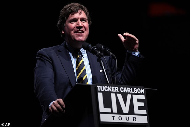 Tucker Carlson, pictured on October 31, has promoted a bizarre conspiracy theory falsely suggesting abortions cause hurricanes