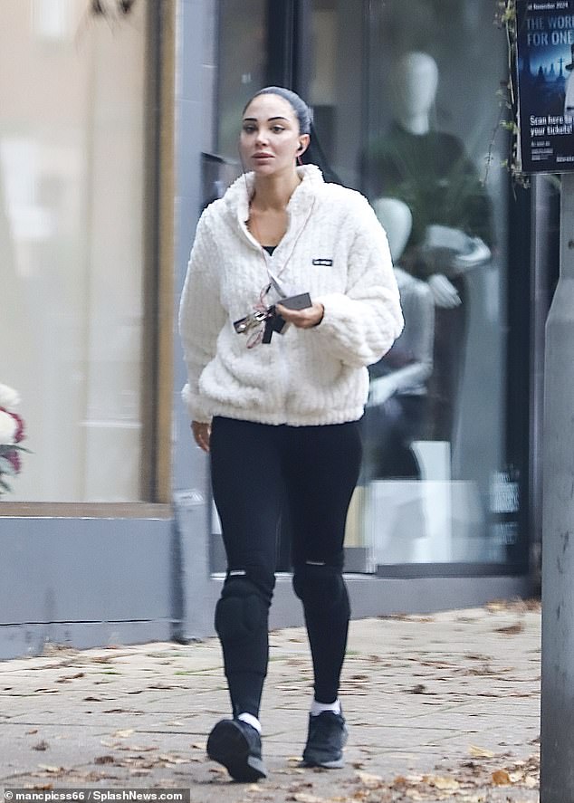 Tulisa kept it casual in a white jumper as she enjoyed a pampering session at the nail salon in Cheshire on Monday in preparation for the I'm A Celeb jungle