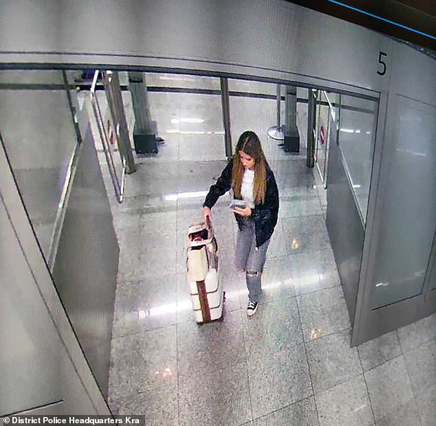 CCTV footage from the airport shows her dressed in gray jeans with ripped knees, a black jacket and black trainers as she pulls a suitcase across the floor