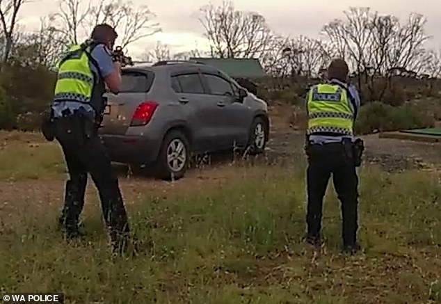 The moment police surrounded the vehicle of two alleged kidnappers who police say shot a man multiple times before leaving him for dead