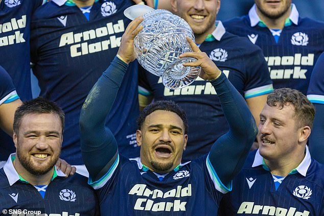 Captain Sione Tuipulotu wins the Hopetoun Cup after Scotland's 27-13 win over Australia