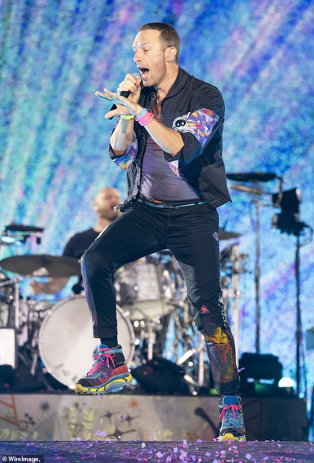 As some 60,000 punters flocked to see what many might consider one of the greatest living bands at Sydney's ANZ Stadium last week, I went alongside to relive the glory of a golden age. Pictured: Coldplay frontman Chris Martin