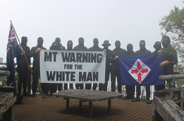 Members of far-right group National Socialist Network in Queensland stage a protest at Mount Warning, which is closed to non-Indigenous people