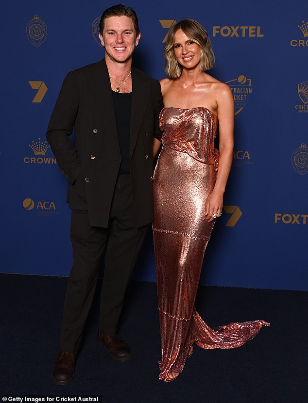 Adam Zampa believes he is now a better red-ball bowler than at any time in his career - despite playing just three first-class matches this decade (pictured, with wife Hattie)