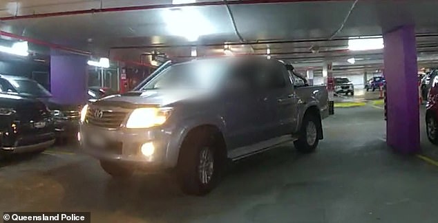 Police heard loud revving, screeching and heavy acceleration coming from a vehicle before two officers approached the ute (pictured) in the car park